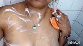 Amateur beauty enjoys a self-made toy in the shower
