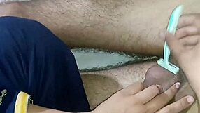 Muslim sister teases with big dick while shaving and rubbing shaved pussy