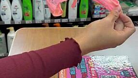 Asian ladyboy flaunts new thong in convenience store 😏