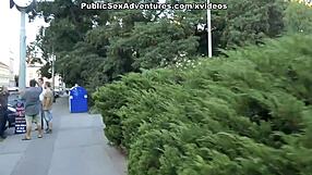 This brunette shows her nice tits naked on the street