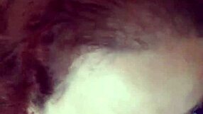 The redhead slut receives cum all over her tits from friend's big cock