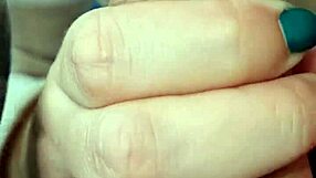 Amateur gives a blow job in a car and licks the fingers clean