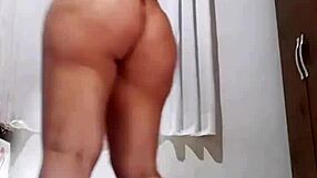 Watch This Naughty Slut Smoke and Strip Teasingly