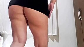 Watch This Naughty Slut Smoke and Strip Teasingly