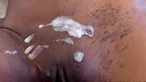 Chocolate teen gets cum on pussy in amateur action