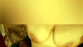 Giant boobs get filled with cum from big cock.