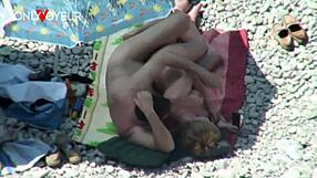 Beach voyeur catches mature couple banging under hot sun