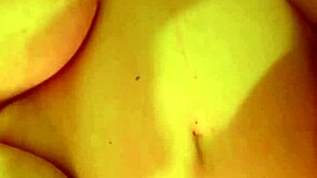 Giant boobs get filled with cum from big cock.