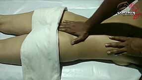 Indian lady receives full body massage in homemade setting close up