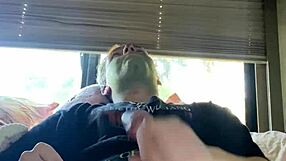 Fit guy strokes his cock while doing skin care routine