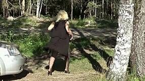 Amateur blonde business woman in public outdoor scene