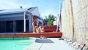 These cute teen lesbians have fun in the pool then fuck hard