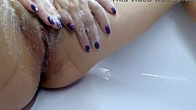 golden rain close-up with sexy asian amateur's shaved body