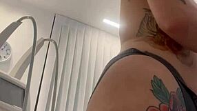 Blonde teases by removing clothes