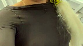 Blonde teases by removing clothes