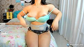 Cosplay Batgirl camgirl strips and gives deepthroat blowjob. She makes him finish on her butt!