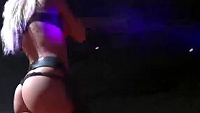 Wow, check this hot babe strip on a public stage! Her flexibility drives the crowd wild!