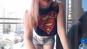 Hot Gamer Girl Teases With Clothed Flashing On Balcony