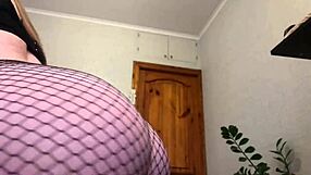 Girl with big tits in fishnet pantyhose solo masturbation