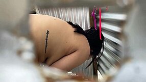 Tattoed mom gets it from her maid in a beach house glory hole scene