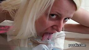 Adorable doll squirts from spread vagina piss