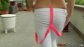 Redhead babe oils up her natural tits outdoors