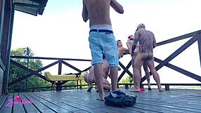 Leaked university orgy video on dormitory deck in red and sheer outfits