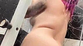 sko ella shows off her tattooed body in the shower. look at those boobs and pussy.