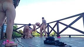 Leaked university orgy video on dormitory deck in red and sheer outfits