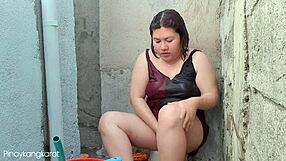 Filipina bathing outside gets fucked by not son daddy.