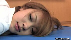 Japanese brunette An Umemiya rides hard in uncensored group action