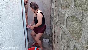 Filipina bathing outside gets fucked by not son daddy.