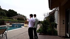 two boys hang out and play around with each other in a casual setting.