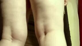 Busty camgirl in grey casually fingers her big ass for viewers