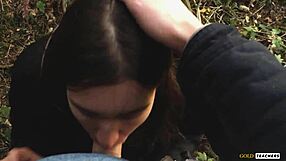 Young Russian girl gives a blowjob in German forest