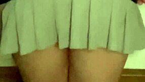 Sensual Latina Student in Mini Skirt and Leather Knee-High Boots Strips Down