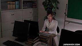 office worker gets wet and wild when her boring job drags on