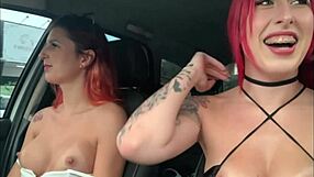 Two redheads show big tits to strangers outdoors