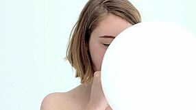 Young Babe Blows and Pops Her First Balloon