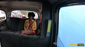 An African beauty gets a rough ride in a fake taxi and enjoys a big cock