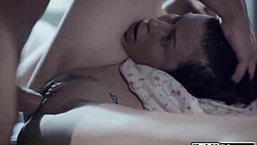 A brunette gets a facial in a threesome with a big cock