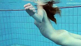 Anna Netrebko's striped swimsuit and small bosom in a hot scene by the pool