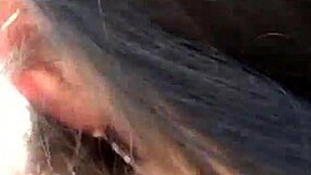 young girl licks old man in forest