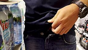 Helping this guy cum in supermarket with handjob on big cock