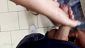 Helping this guy cum in supermarket with handjob on big cock