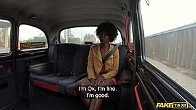 An African beauty gets a rough ride in a fake taxi and enjoys a big cock