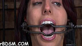 Bizarre pleasures await this hot brunette babe in hardcore bdsm fetish play with slave vibes. Her tits tremble under wild masturbation.