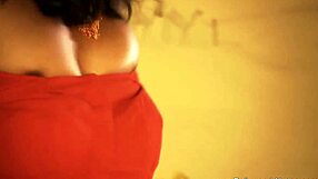 The seductive Indian MILF dances and undresses to seduce the man.