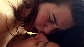 A couple engages in spontaneous passionate kissing and ball sucking