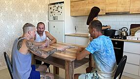 Lost his young wife at cards and stretched her tight pussy on the kitchen table with group fun